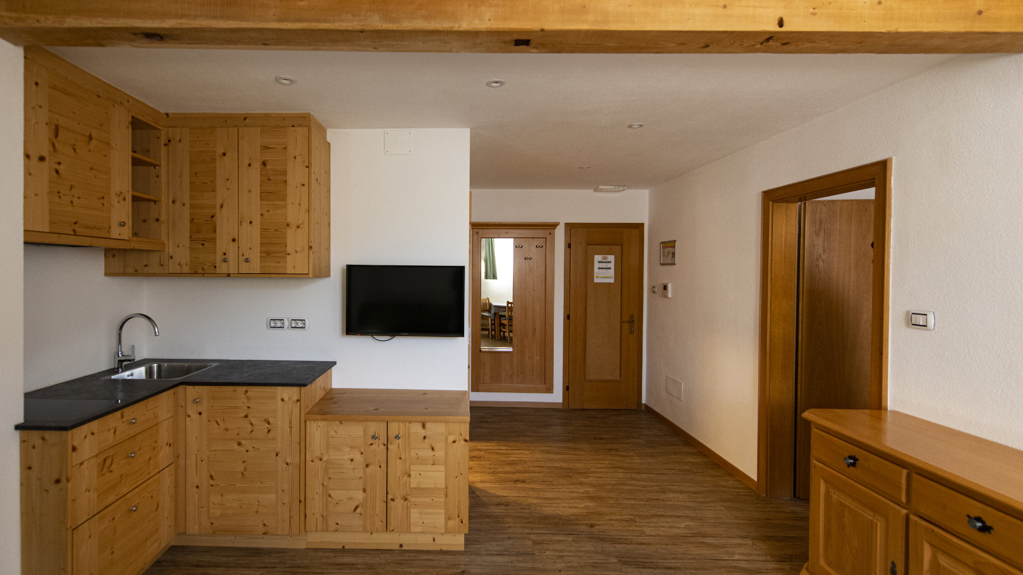 Apartment Drei Zinnen Wohnbereich mit Küche