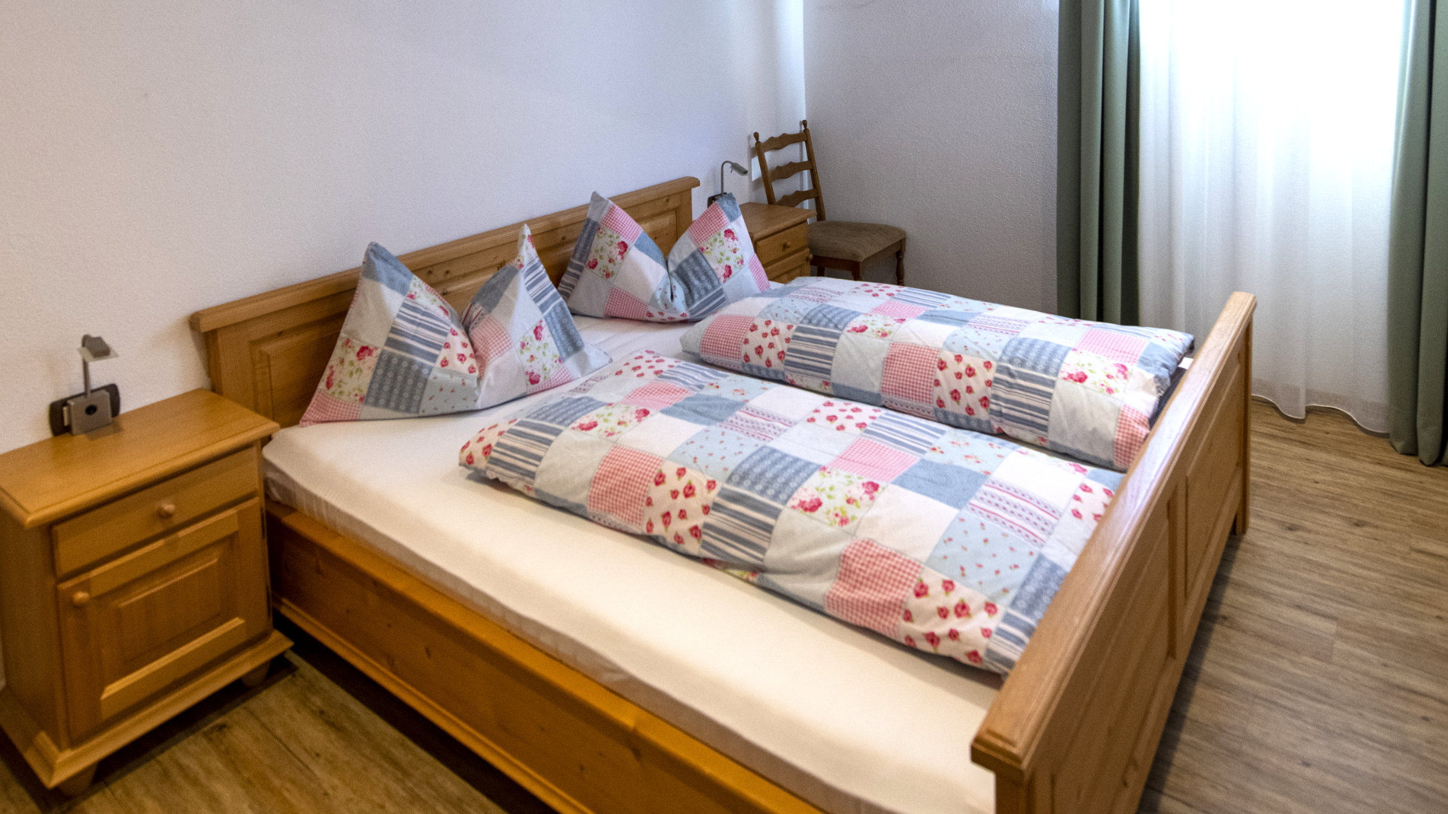 Apartment Drei Zinnen Bett